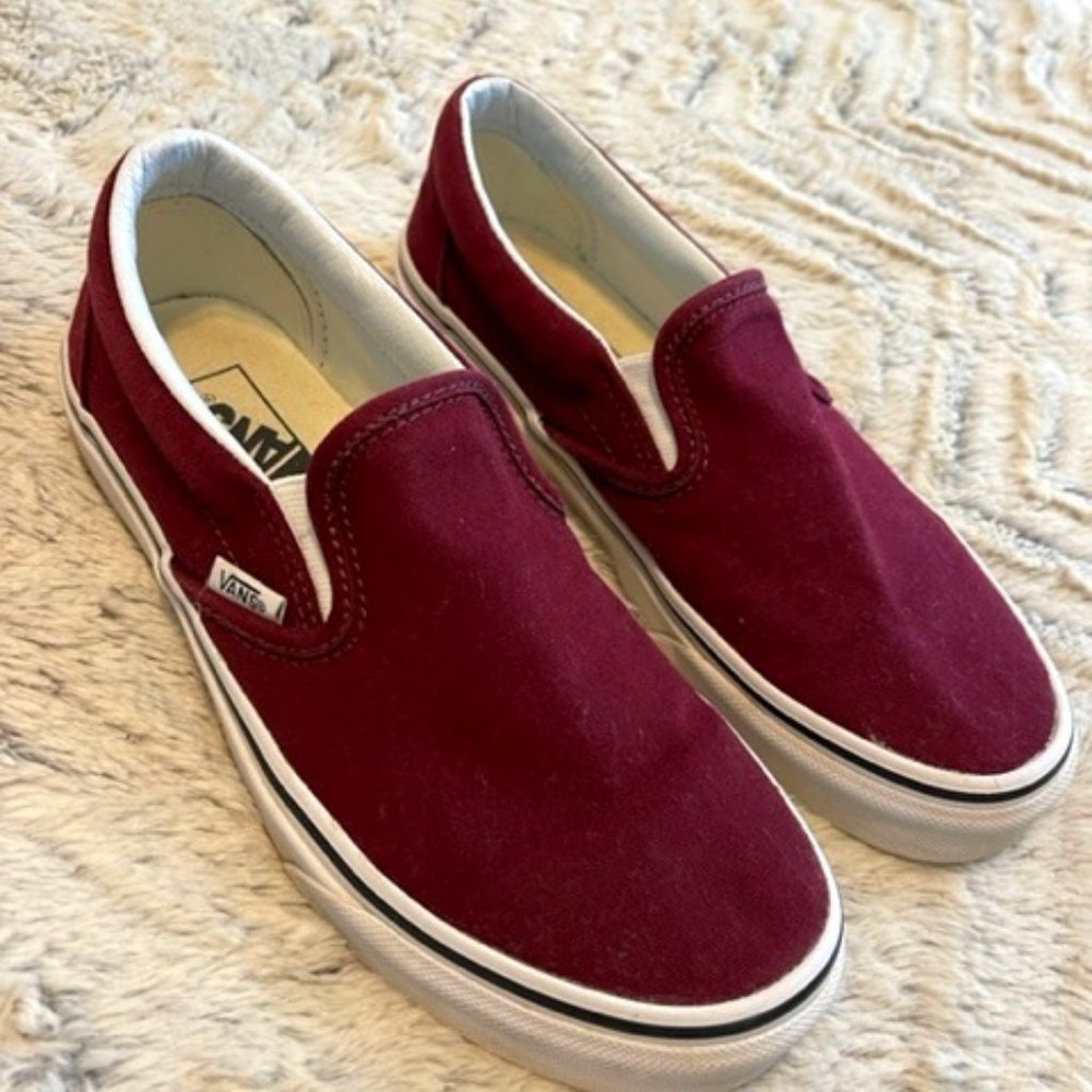Maroon colored low Vans